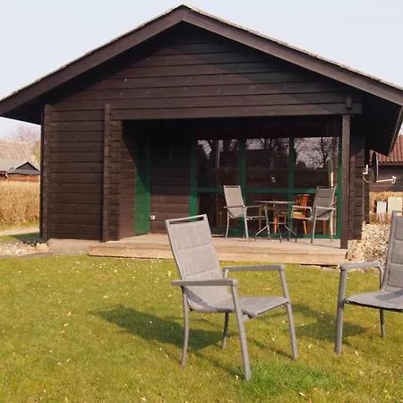 Blockhaus Holzfaeller Damp